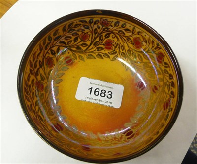 Lot 1683 - A Pilkington's Royal Lancastrian Lustre Bowl, decorated by Annie Burton, scrolling red flowers...