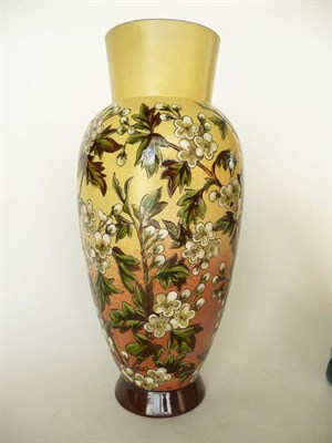 Lot 1694 - A Linthorpe Pottery Vase, shape No.477, painted by Clara Pringle, with white daisies and...