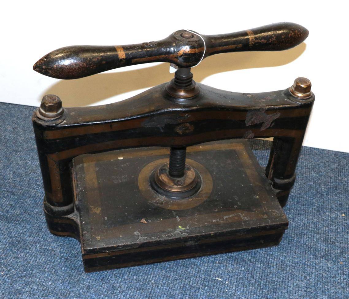 Lot 176 - Book Binding Screw book press, black with gold decoration.
