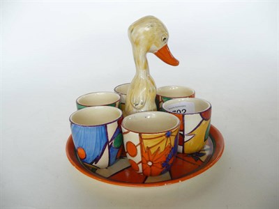 Lot 1702 - A Clarice Cliff Fantasque Sunray Leaves Duck Cruet Set, comprising circular tray surmounted by...