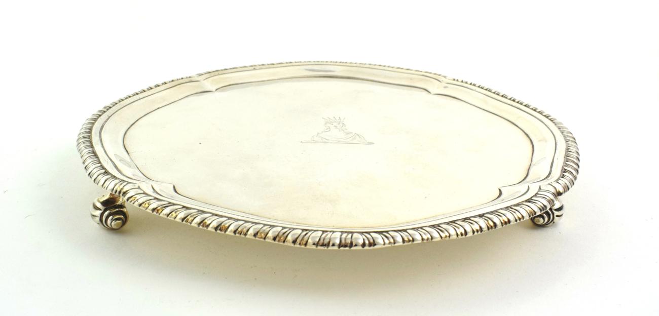 Lot 14 - A George III Silver Waiter, by John Carter, London, 1771, shaped circular and with gadrooned...