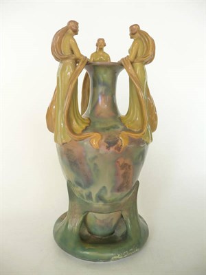 Lot 1708 - A Zsolnay Pecs Figural Vase, the shoulder of the vase mounted with three maidens wearing...