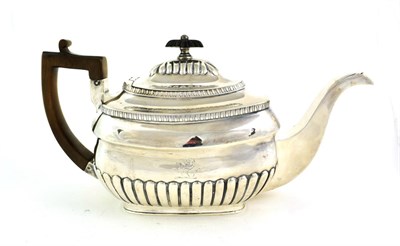 Lot 25 - A George III Silver Teapot, by William Bennett, London, 1807, shaped part-fluted oblong, with...