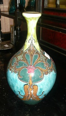 Lot 1709 - A Rozenburg Earthenware Vase, painted with stylised flowers, in tones of green, blue, red and...