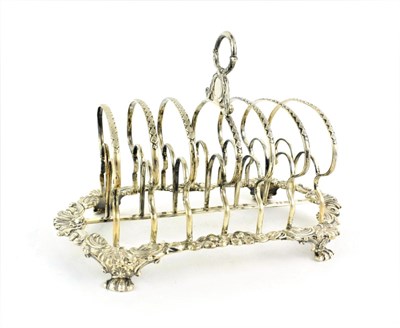 Lot 42 - A George IV Silver Toast-Rack, by Thomas and John Settle, Sheffield, 1820, the seven bars on...