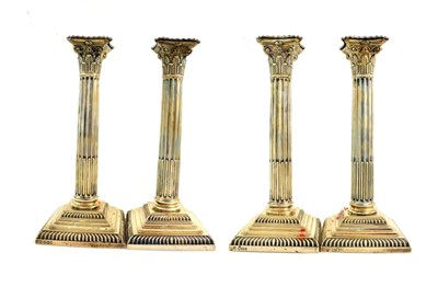 Lot 54 - Four Victorian Silver Candlesticks, Three by William Gibson and John Langman, Two Sheffield,...