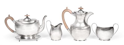 Lot 92 - A Four Piece George V Silver Tea-Service and an Associated Edward VII Silver Teapot-Stand, the...