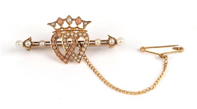 Lot 139 - A Luckenbooth Brooch, circa 1900, the double heart motif set with coral and split pearl, on a...