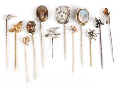 Lot 148 - Twelve Stick Pins; including a diamond set bird example, cased, four bug examples, a snake...