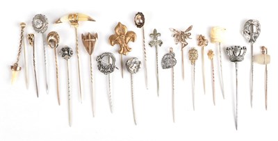 Lot 153 - Twenty-One Stick Pins; including one with a tooth suspended, cased, silver examples, a fairy...