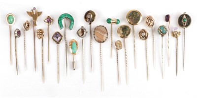 Lot 159 - Twenty-Two Stick Pins, including a moss agate example, an amethyst thistle example, other...