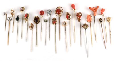 Lot 160 - Twenty-Three Stick Pins including four coral portrait examples; five other coral examples; a snake