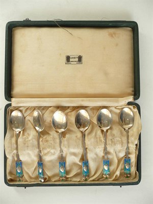 Lot 1723 - A Set of Six Liberty & Co Silver Tea Spoons, each with enamelled terminals in green and blue,...