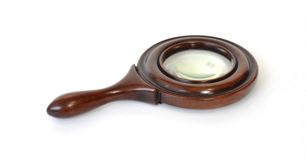 Lot 300 - A Victorian Mahogany Magnifying Glass, with turned frame and handle, 26cm long