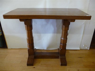 Lot 1745 - A Robert "Mouseman" Thompson Oak Extension Table, on two octagonal legs joined by a stretcher...