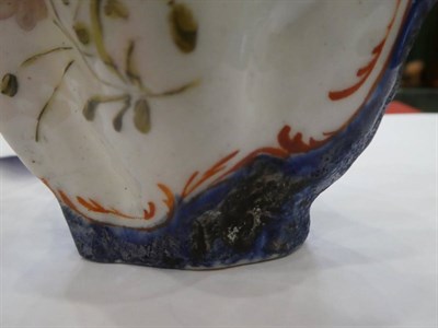 Lot 422 - A West Pans Porcelain Cream Jug, circa 1765, of leaf moulded oval form, painted with flower...