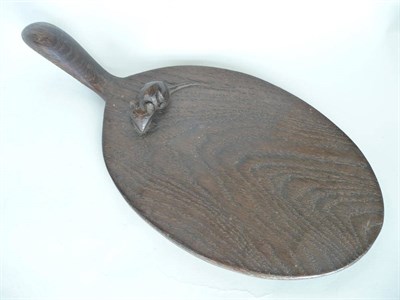 Lot 1754 - A Robert "Mouseman" Thompson Oak Cheese Board, with carved mouse signature on the board, 37cm (good