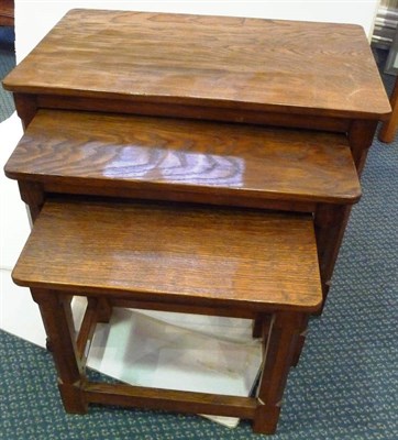 Lot 1760 - A Robert "Mouseman" Thompson Oak Nest of Tables, on four octagonal legs, each with carved mouse...