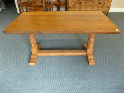 Lot 1766 - A Robert "Mouseman" Thompson Oak 5ft Refectory Table, dowelled four plank top, on two octagonal...