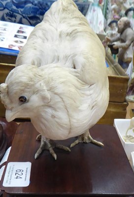 Lot 624 - A Japanese Ivory Model of a Chicken, Meiji period, naturalistically modelled standing on a hardwood