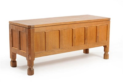 Lot 1774 - A Robert "Mouseman" Thompson Panelled Oak Blanket Box, on four octagonal and block feet, with...