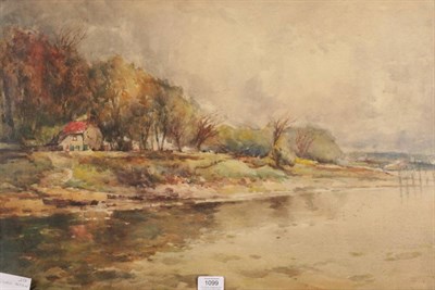 Lot 1099 - George Horton (1859-1950) Cottage by a river Signed, watercolour, 44cm by 64cm  Provenance: J R...