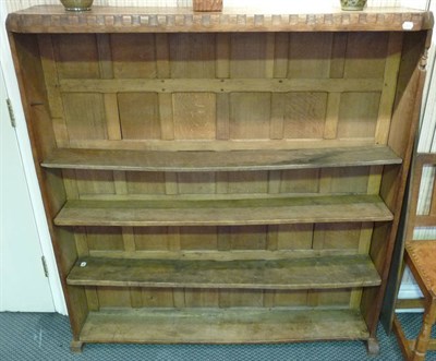 Lot 1780 - A Pair of Thomas "Gnomeman" Whittaker Oak Open Bookcases, with castellated top, panelled back,...