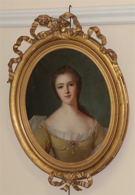 Lot 1162 - British School (19th century) Portrait of a lady in a yellow dress adorned with jewels Oil on...