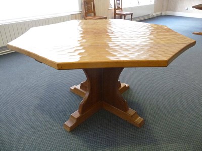 Lot 1785 - An Old Mill "The Knight Family" Oak Octagonal Dining Table, adzed four plank top, on cruciform...