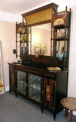 Lot 1787 - An Aesthetic Movement Ebonised Mirror Back Sideboard, the back with a central bevelled edged mirror