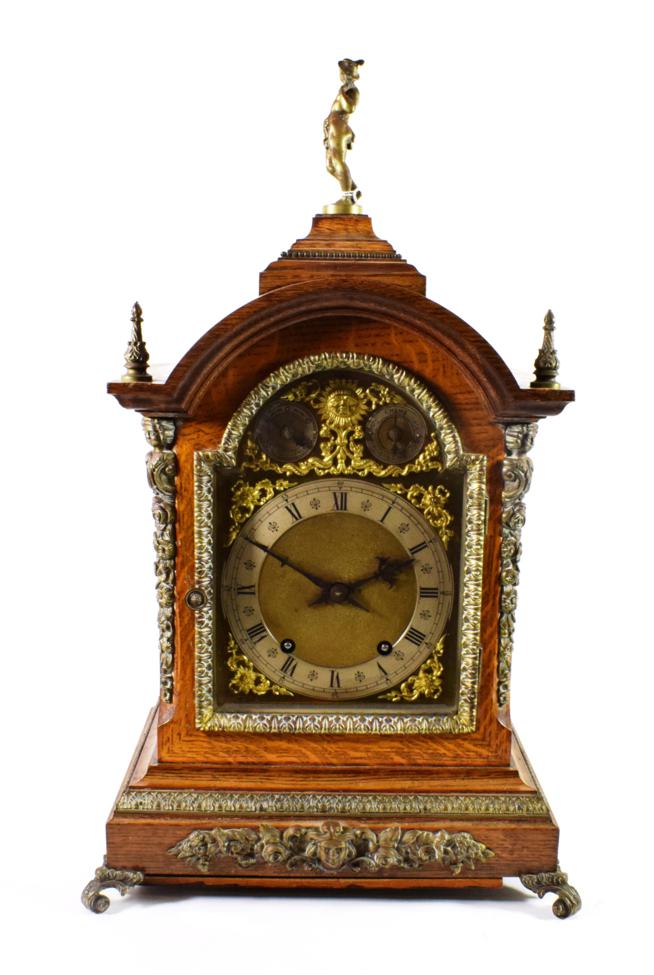 Lot 1506 - An Oak Quarter Striking Table Clock, circa 1890, arched pediment, pierced side sound frets, applied