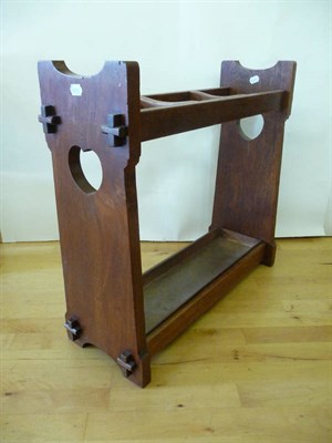 Lot 1790 - A Wylie & Lochhead Mahogany Stick Stand, with three divisions between end supports each with a...