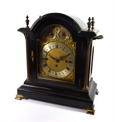 Lot 1539 - A Victorian Ebonised Chiming Table Clock, circa 1870, arched pediment, urn/acorn finials, side...