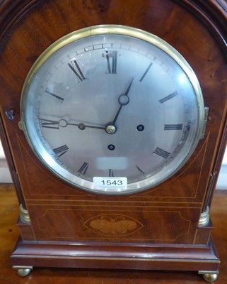 Lot 1543 - A Regency Style Mahogany Inlaid Chiming Table Clock, circa 1900, arched pediment with brass...