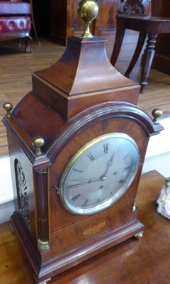 Lot 1543 - A Regency Style Mahogany Inlaid Chiming Table Clock, circa 1900, arched pediment with brass...