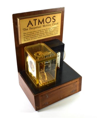 Lot 1547 - A Brass Atmos Advertising Clock, signed LeCoultre Co, 20th century, movement numbered 19317,...