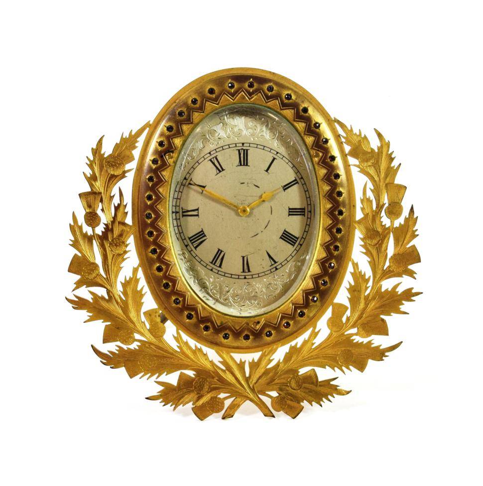 Lot 1554 - A Gilt Brass Strut Timepiece in the manner of Thomas Cole, circa 1860, engraved thistle pierced...