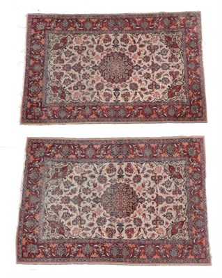Lot 1586 - Pair of Kashan Prayer Rugs Central Iran, circa 1930 Each with a cream field of vines centred by...
