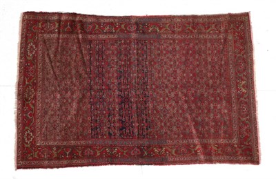 Lot 1589 - Malayir Rug West Iran, circa 1930 The abrashed Herati field enclosed by meandering vine...