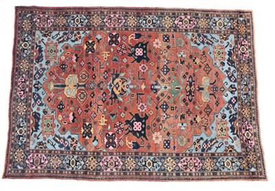 Lot 1595 - Khoy Carpet North West Iran, circa 1920 The terracotta field of angular vines framed by sky...