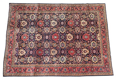 Lot 1601 - Tabriz Carpet Iranian Azerbaijan, circa 1970 The indigo field with an allover design of...