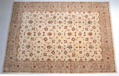 Lot 1603 - Afghan Ziegler Design Carpet, modern The ivory field with an all over design of vines and palmettes