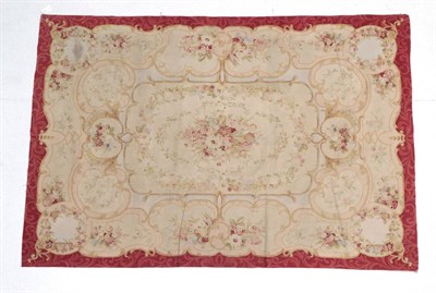 Lot 1613 - Aubusson Design Flatweave Carpet China, modern The ivory field centred by a naturalistic floral...