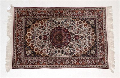 Lot 1618 - Chinese Silk Rug, modern The ivory field of scrolling vines around a central medallion framed...