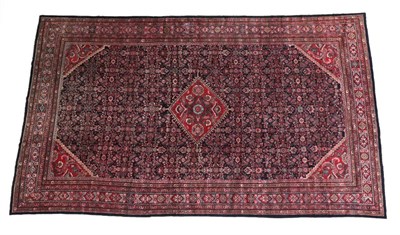 Lot 1631 - Mahal Carpet West Iran, circa 1930 The indigo Herati field with central diamond medallion framed by