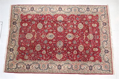 Lot 1638 - Tabriz Carpet Iranian Azerbaijan, circa 1950 The blood red field with an allover design of...