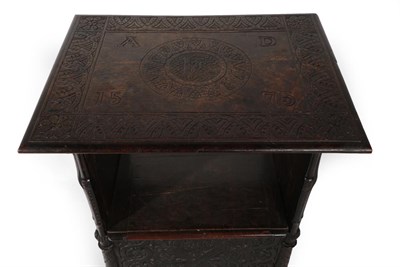 Lot 1645 - A Carved Oak Monk's Chair, bearing date 1575 and initials AD, the pivoting top with a carved border