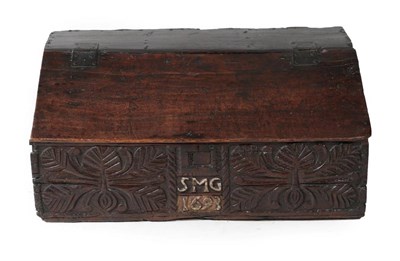 Lot 1650 - A 17th Century Carved Oak Bible Box, bearing initials SMG and dated 1693, the hinged lid above...