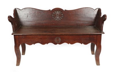 Lot 1655 - A Joined Oak Bench, late 18th/early 19th century, the low back support centred by a carved...