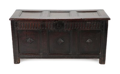 Lot 1674 - A Late 17th Century Joined Oak Chest, the hinged lid with three moulded panels above a nulled...